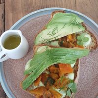 Avocado toast with kimchi in a gluten free bread at Hygge in Milan