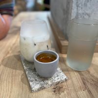 Iced latte with locally-made vegan milk at Sisu Coffee Studio in Panama City