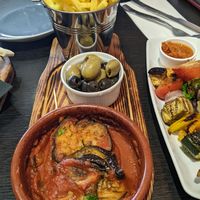 Baked aubergine, olives, fries at Central 42 in Beverley