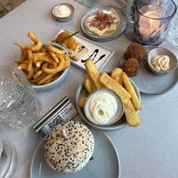 Bruchetta with mango and coconut crème, crispy wrap, seaweed bitterballen, ‘chicken’ burger. Again all vegan.  at Rozey in Amersfoort