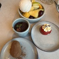 Fruit bowl, Rozey’s garden, mini red velvet cupcake, truffle. All vegan.  at Rozey in Amersfoort