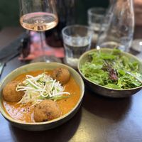 Indian dumplings with small lettuce salad   at Tula Bistro in Salzburg