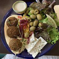 Falafel, hummus, feta, olives, salad, tahini dressing.  at Tula Bistro in Salzburg