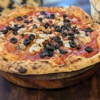 🍕 Pizza Marinara (without anchovies) 17k - toppings are extra 1k each (Olives & Champignons) at Fatto in Casa  in Taganga