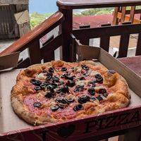 🍕 Pizza Marinara (without anchovies) 17k - toppings are extra 1k each (Olives & Onion's) at Fatto in Casa  in Taganga