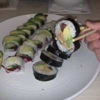 Holding my favorite, the Inari Maki Roll.  at Zen Sushi in Dallas