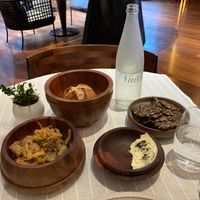 Bread service: bread, fermented veggies, vegan butter, crackers at Gioia Cocina Botánica in Buenos Aires