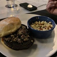 Portobello mushroom cap burger and pasta salad  at Goblin & The Grocer in Beverly Shores