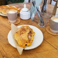 Warmer Flammkuchen-Panini, Laugenstange mit Frischkäse, Schokoschnute, 2 kleine Cappuchinos at Hempies - Händelstraße in Cologne
