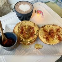 Brioche with hummus and hojicha latte  at The Hippie Baker in Vigo