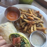 Fresh juice and satisfying SOL burrito. 100% vegan 100% delightful at Soluna Cafe in Jackson