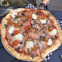 Down to earth pizza (swap to tomato base)  at The Attic Bar & Stage in Calgary