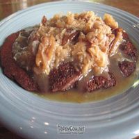 Vegan German Chocolate Pancakes- loaded with coconut-pecan topping at Vegeria - Viva Book Complex in San Antonio