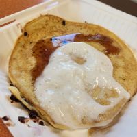 Chocolate chip pancake with coconut whip cream and syrup! at The Station Bistro in Conway