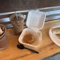 Almond joy smoothie bowl, iced coffee, cookies, breakfast wrap with tofu scramble  at The Station Bistro in Conway