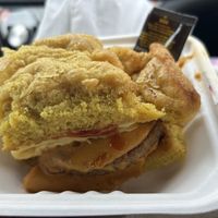 breakfast sandwich with sausage on a biscuit (and some hot sauce 🤭)  at The Station Bistro in Conway