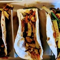 Vegan flour burritos; not oily, just perfectly spiced. The zucchini is done SO well here:) at LUNA in Murrells Inlet