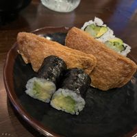 Teeny sushi bites and sad, dry, skinny inari 😕 at Umi Sushi in Green Bay