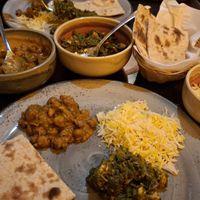 Chana masala, saag khumb (ask for it vegan), tandoori roti and saffron pilau rice at Purple Poppadom in Cardiff