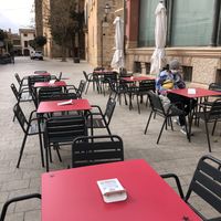 Outdoor seating with view onto the market place  at El Hummus in Mallorca