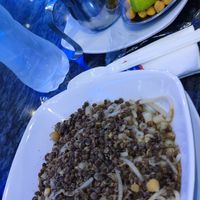 Before using the sauce and you see the additions, lime, chickpeas etc. at Abu Tarek in Cairo