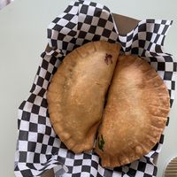 lentil curry and roasted pumpkin empanadas   at Munchies in Willemstad
