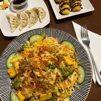 Vegetable steamed dumplings, fried rice noodle with vegetables and tofu, fried banana cake at Sen in Budapest