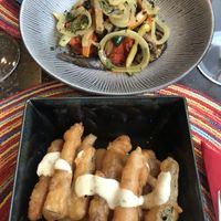 Friscous at the bottom and on the top chips and crock  at La Bodeguita del Mar in Santa Maria