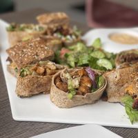 Chicken Gyros, Mini burger, jackfruit wrap  at Elysian Plant Based Kitchen Bar in Limassol