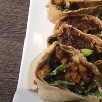 Two types of gyros and burger   at Elysian Plant Based Kitchen Bar in Limassol