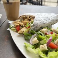 ice cappuccino and gyros   at Elysian Plant Based Kitchen Bar in Limassol