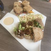 Vegan platter. Mini burger, chick’n pitta and pulled jackfruit wrap  at Elysian Plant Based Kitchen Bar in Limassol