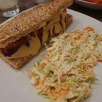 Hotdog and coleslaw   at Elysian Plant Based Kitchen Bar in Limassol