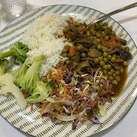 Mushroom and pea stew with veg, rice and slaw  at Vegan Details in Braga