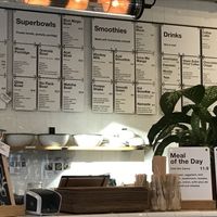 Het menu hangt aan de muur  at Wild & The Moon - Van Woustraat in Amsterdam