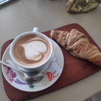 Cappuccino and vegan croissant at Beans and Tales in Malmo