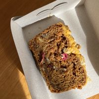 carrot cake decorated with dried flowers   at All Greens  in Amsterdam