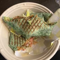 Crunchwrap 💕 Had to take a few bites right away!   at Vegan Grill - St Marks in New York City