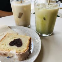 Lemon cake with chocolate heart and two lattes   at Wyld in Stuttgart