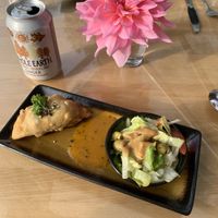 Samosa served with a salad  at Govinda's Restaurant in Septon