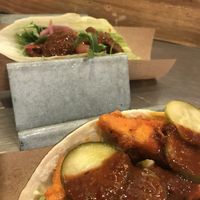 nashville tofu (front) n falafel (far) drench'd w/ house hot sauz at Velvet Taco in Houston