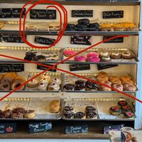 That’s where today’s donut flavor was located. Up top, 2nd from left.  at Duke's Donut Worx in Mashpee