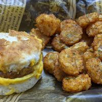 Sausage egg and cheese biscuit with crowns at Atypical Vegan n More in Canton