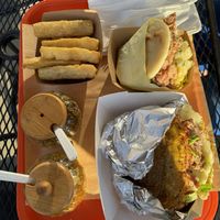 yuca fries, jackfruit Hawaiiana arepa, patacon sandwichh  at Miss Arepa in Lahaina