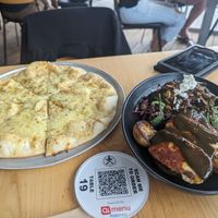 Flatbread and haloumi salad at Stoked in Whitianga