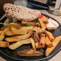 Falafel burger pita with fries at Café de Jaren in Amsterdam
