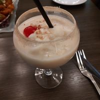 KERALA PINA COLADA: old monk rum + malibu coconut rum + coconut cream + pineapple juice at Noon Mirch in Webster