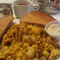 Tofu scramble w potatoes, vegan sausage & vegan butter; coffee w almond milk at Butter Cafe in Dayton