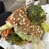 Vinnie and Matt on za’atar bagel — yum!  at Rachel's Bagels & Burritos in Seattle