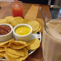 Vegan nachos , Iced chaï latte and san Pellegrino (8$, 4$ and 2$ CAD) at Cafe Cambio in Chicoutimi